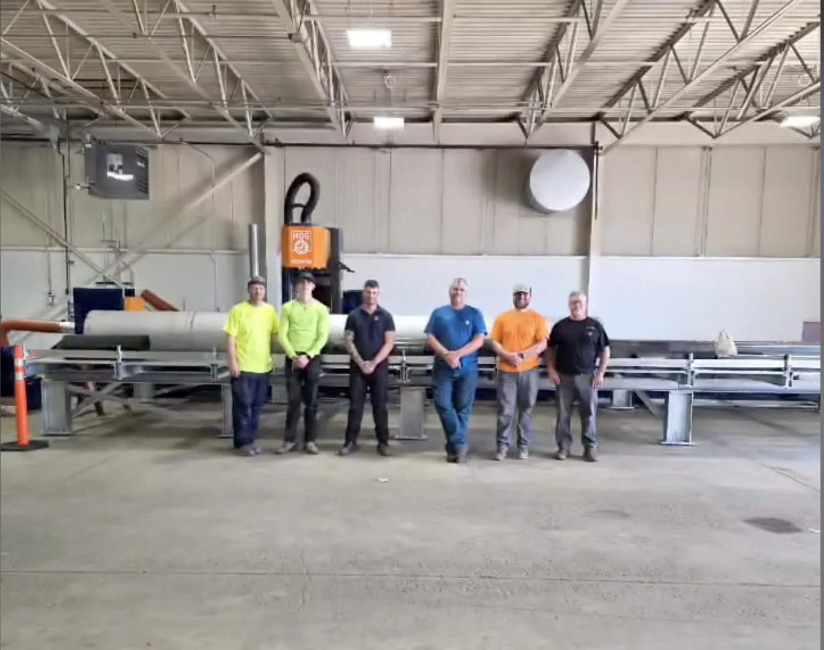 WJO fabrication team standing in front of the new HGG 900 RB pipe profiler